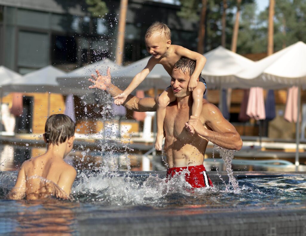 Family activities in swimming pool