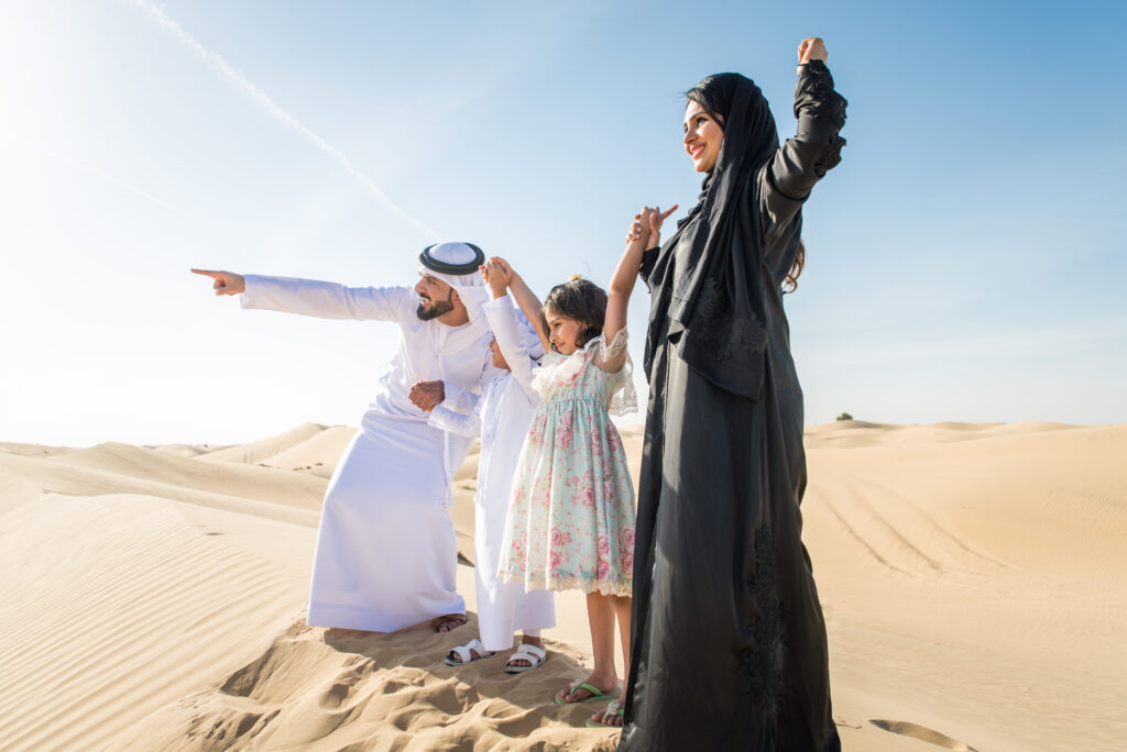 Budjet friendly hotel in madinat zayed - Family enjoying in desert
